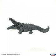 Dire Crocodile - Dark gray detailed fantasy crocodile figurine with open mouth and textured scales.