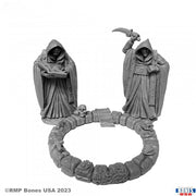 Townsfolk: Cultists - Two detailed gray resin cultist miniatures in hooded cloaks with skulls and a ring of stones and bones.