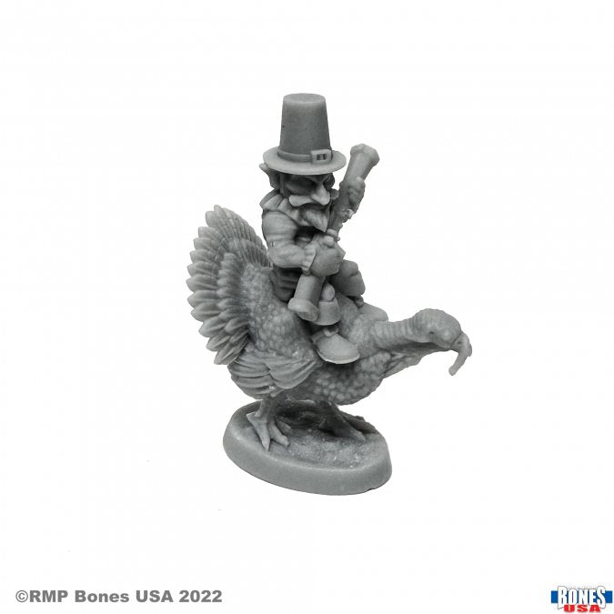 Smigo and Gobbins - Gray resin fantasy miniature of a bearded figure with a tall hat riding a large bird with spread wings.