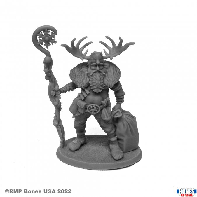 Saint Nicholas the Mighty - Gray resin miniature of a muscular fantasy warrior with antlered helmet, holding a twisted staff and sack.
