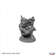 Scrub, Mongrelman - Gray unpainted fantasy miniature of a goblin-like creature holding a wrench and standing on a cobblestone base.