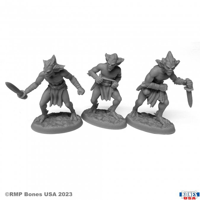 Morbids (3) - Three gray resin fantasy miniatures of humanoid creatures wearing torn robes and holding blades, standing on round bases.