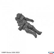 Townsfolk: Drunken Orc - Dark gray resin miniature of a reclining orc with muscular build, wearing rugged pants and holding a tankard.