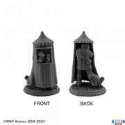 Townsfolk: Puppeteer - Dark gray resin miniature featuring a cloaked puppeteer with a small dog beside him, shown front and back views.