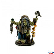 Gertie Gristlebreath - Green-skinned goblin figurine with long black hair, wearing tattered clothing, holding a skull staff and severed head on a.