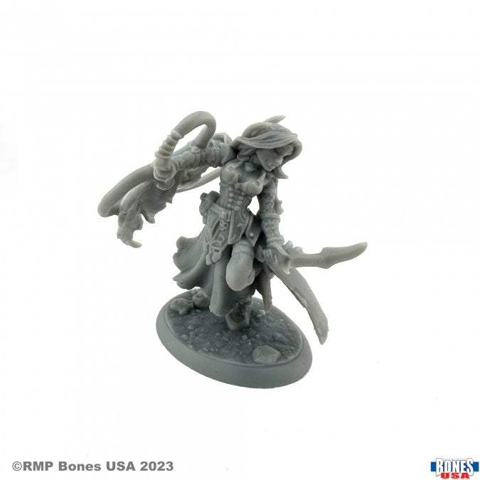 Elsabeth, Female Vampire - Unpainted gray resin figurine of a female vampire with flowing hair, armored clothing, dual curved swords, and a dynamic.