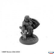 Freya Fangbreaker, Dwarf Shieldmaiden - Gray unpainted dwarf female warrior miniature with round shield and axe on round base.