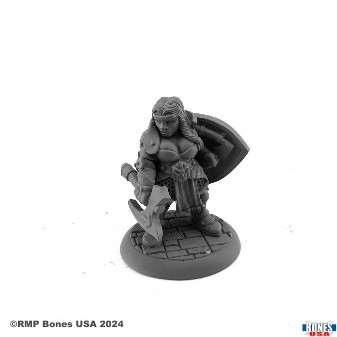 Freya Fangbreaker, Dwarf Shieldmaiden - Gray unpainted dwarf female warrior miniature with round shield and axe on round base.