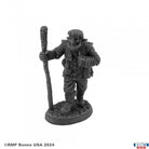 Adric, Wildfolk Druid - Gray resin miniature of a bearded druid holding a tall staff, wearing detailed robes and boots, standing on a textured base.