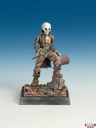 Monsieur Mort (Unpainted) - Unpainted miniature of skeleton figure dressed in tattered brown clothing, holding large hammer, standing on rocky base with