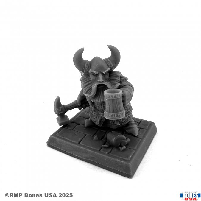 Dwarven Hero - Gray miniature figure of a horned dwarf warrior holding a tankard and axe on a square stone base.