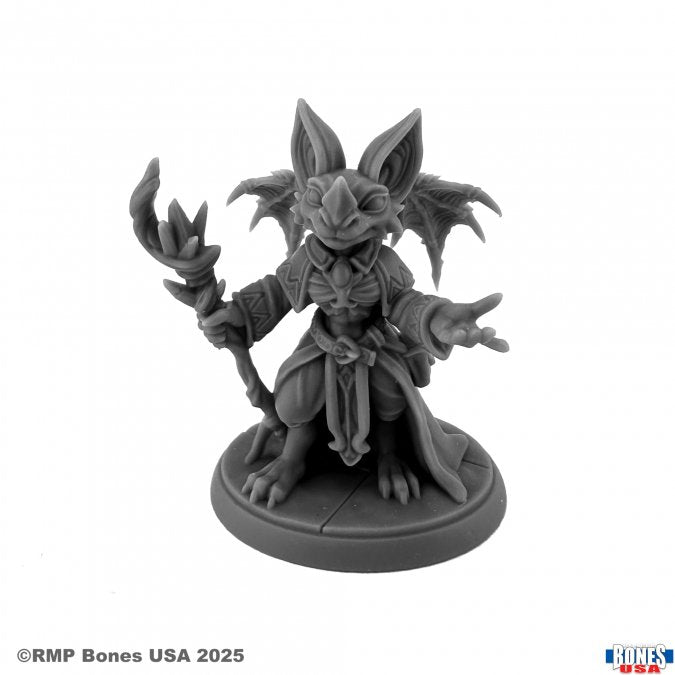 Bebe, Female Batling - Gray resin miniature of a female batling holding a staff, wearing robes with bat wing details and large pointed ears.