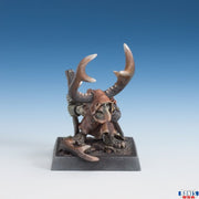 Goblin Shaman (Unpainted) - Unpainted resin goblin shaman miniature with large curved horns, crouching pose, and tribal staff on square base.