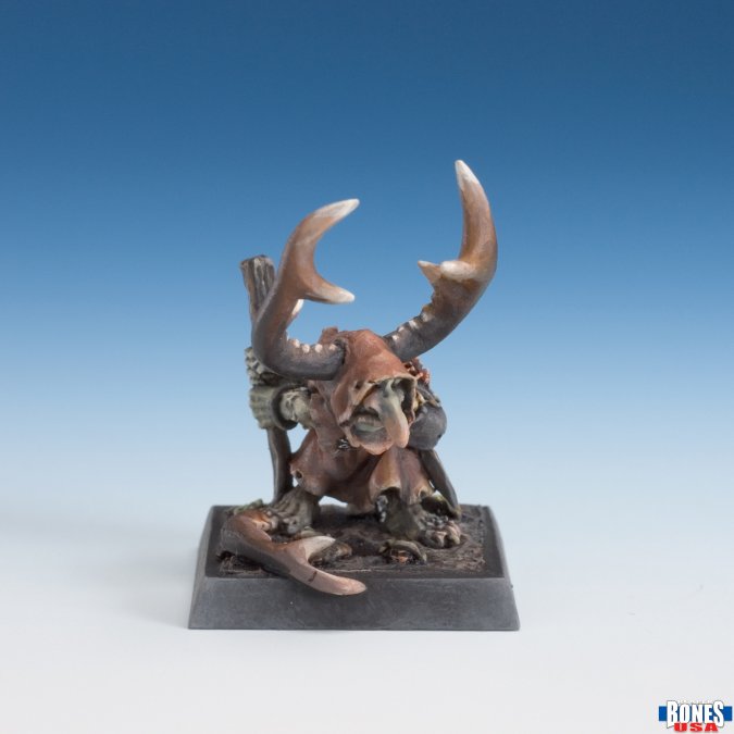 Goblin Shaman (Unpainted) - Unpainted resin goblin shaman miniature with large curved horns, crouching pose, and tribal staff on square base.
