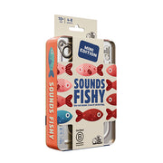 Sounds Fishy Tin - Rectangular metal tin with colorful red and blue fish illustrations, labeled "Sounds Fishy Mini Edition" for a party game.