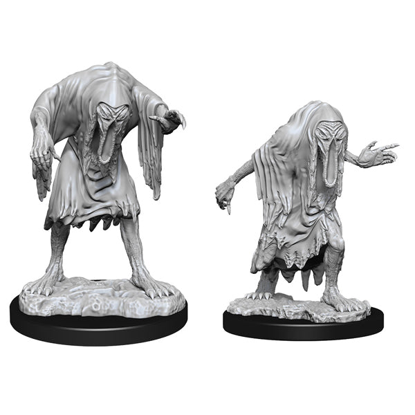 D&D Nolzur's Marvelous Miniatures: Bodaks - Two gray plastic miniature figures of Bodak creatures with tattered robes, elongated faces, and clawed hands on round black.