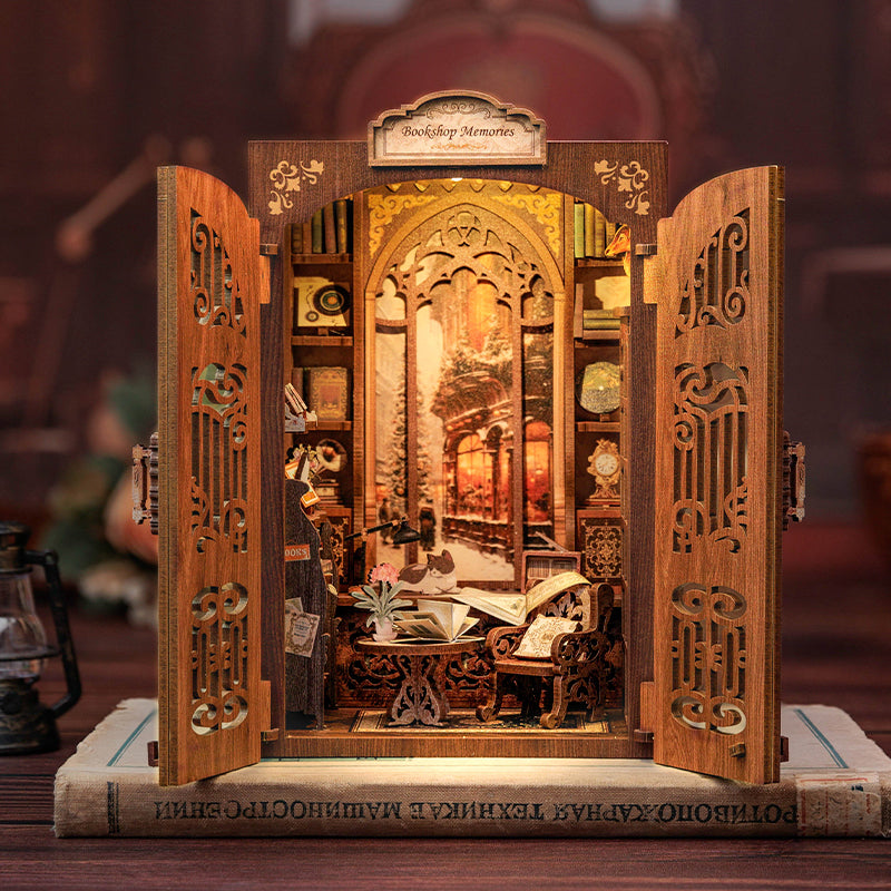 Bookshop Memories Book Nook (PREORDER) - Intricately detailed wooden book nook with open lattice doors revealing a cozy bookshop interior featuring miniature.