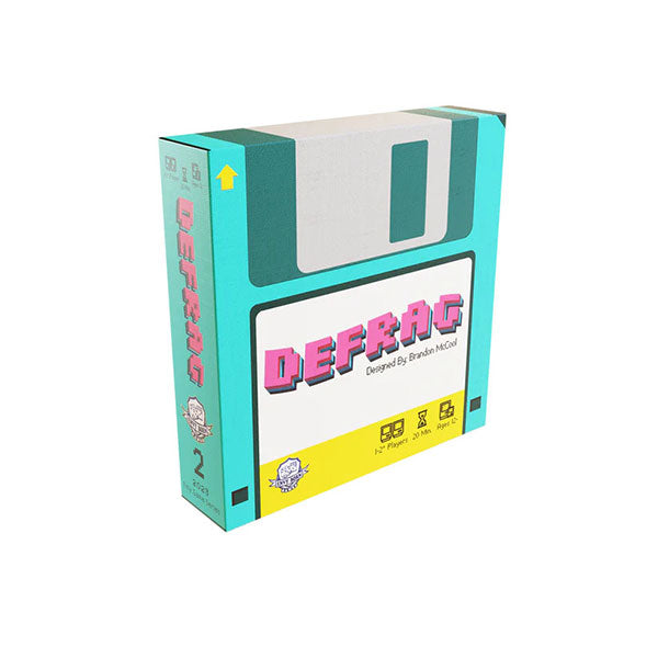 Defrag - Retro-style game box designed like a teal and gray floppy disk with pink "DEFRAG" text on the front label.