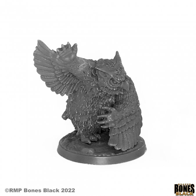Owlbear - Gray resin miniature of an owlbear with detailed feathers and claws on a round base.