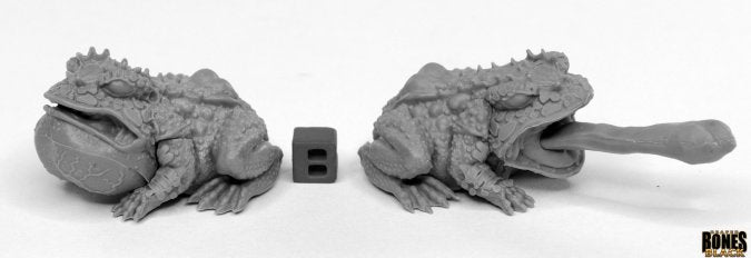Giant Frogs (2) - Pair of detailed gray fantasy giant frog sculptures, one with extended tongue catching prey, on white background.
