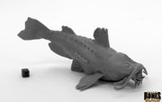 Gulper - Detailed dark gray fantasy creature resembling a large catfish with textured scales and whiskers, posed with fins spread.