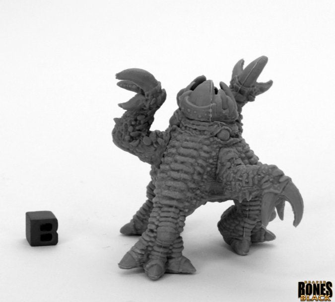 Rockmaw - Gray fantasy creature miniature with rocky texture, clawed limbs, and open mouth teeth.