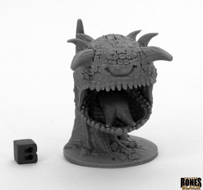 Dark Watcher - Dark gray fantasy monster sculpture with large open mouth, horns, and textured skin on round base.