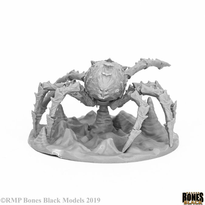 Cave Spider - Gray detailed fantasy cave spider miniature with spiked legs on textured base.