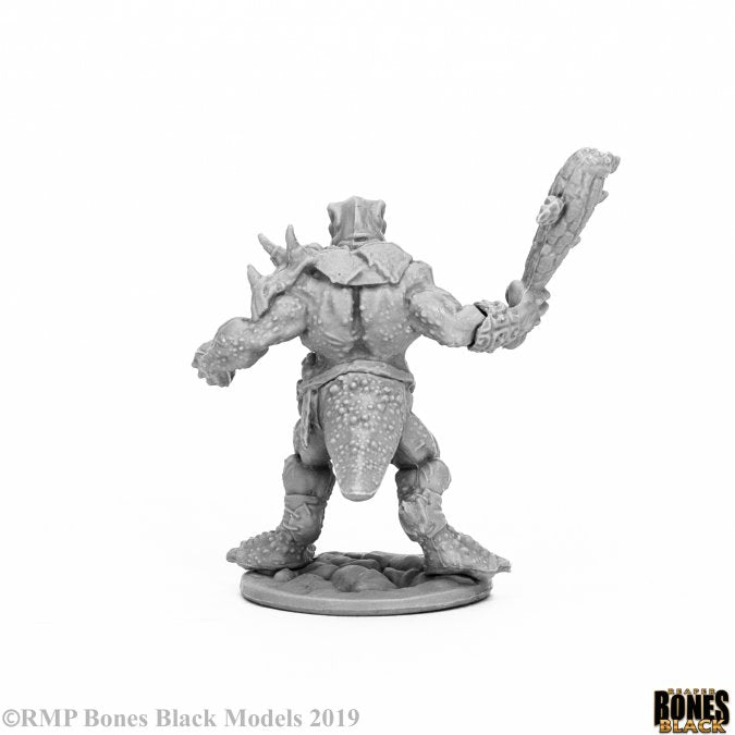 Blacktooth Savage - Gray fantasy orc miniature holding a spiked club with armor and spikes on back.