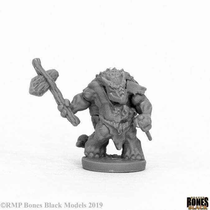 Armorback Barbarian - Gray fantasy barbarian miniature with spiked armor and large club raised overhead.