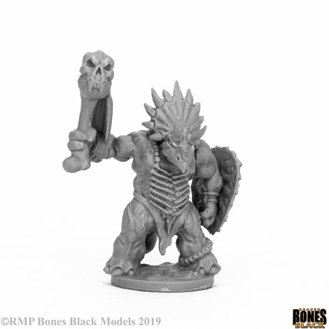 Thunderfoot Defender - Grey fantasy warrior miniature with spiked helmet, wielding skull-topped club and shield.