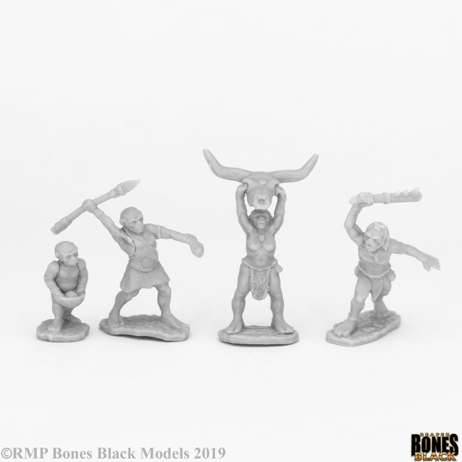 People of the Dawnlands (4) - Set of four unpainted grey fantasy miniatures depicting humanoid warriors in dynamic poses, one holding up a horned skull.