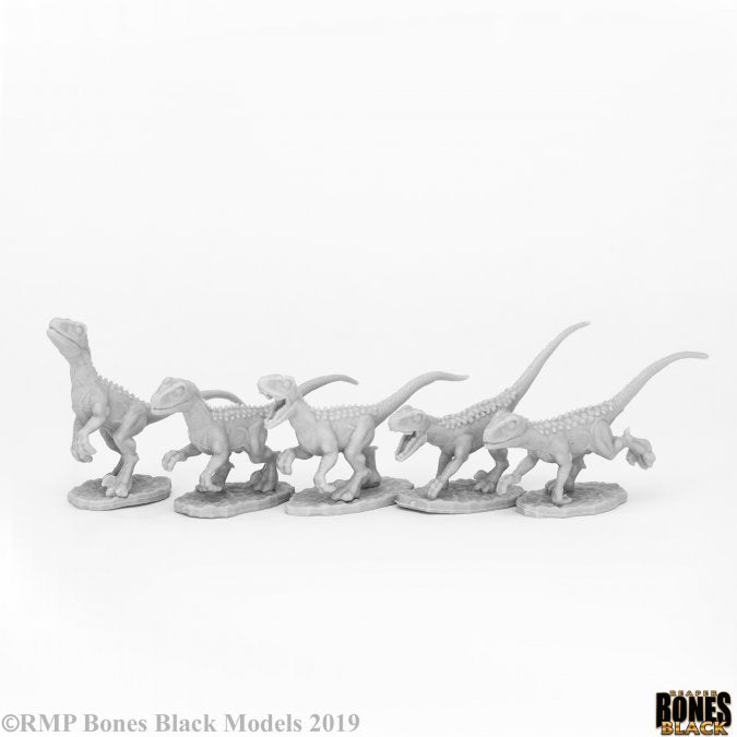 Raptor Hunting Pack (5) - Set of five unpainted fantasy dinosaur miniatures in dynamic hunting poses, detailed scales and claws visible.
