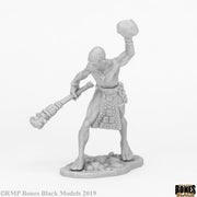 Stone Giant Guard - Gray plastic miniature of a muscular giant wielding a large stone hammer, wearing a detailed loincloth and armor plate on a.