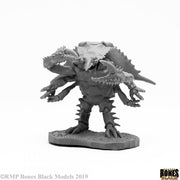 Crab Man - Gray unpainted fantasy miniature of a crab-like humanoid with large claws and spiked limbs on a textured base.