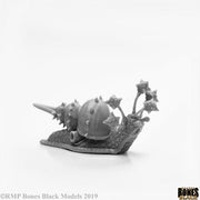 Thrasher Snail - Gray fantasy snail sculpture with spiked armor shell and mace-like protrusions on its back.