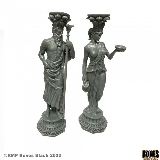 Greek Pillars (Zeus and Hera) - Gray statues of Zeus holding a staff and Hera holding a bowl, each standing on ornate hexagonal bases.