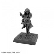 Sara, Steampunk Alchemist - Gray resin miniature of a hooded female alchemist in boots, holding a potion bottle, standing on a textured wooden base.
