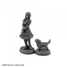 Wild West Oz - Dorothy - Gray resin miniature of a girl in a ruffled dress with braids standing next to a small fluffy dog on separate round bases.