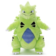 Pokémon I Choose You! - 10.5" Tyranitar Plush - Soft plush Tyranitar figure in light green with blue belly, black triangular markings, and white claws, 10.5 inches tall.