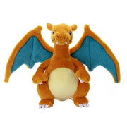 Pokémon I Choose You! - 8.5" Charizard Plush - Orange and cream Charizard plush with blue wing membranes and stitched facial details, standing upright.