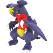 Pokémon All Star Collection - Garchomp Plush - Plush Garchomp Pokémon in dark blue and red with yellow belly and wing details, soft fabric texture.