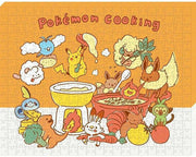 Puzzle: Pokemon "Pokemon Cooking" Artboard Jigsaw (PREORDER) - Colorful Pokémon-themed jigsaw puzzle featuring Pikachu, Eevee, and others cooking together around a large pot on an orange.