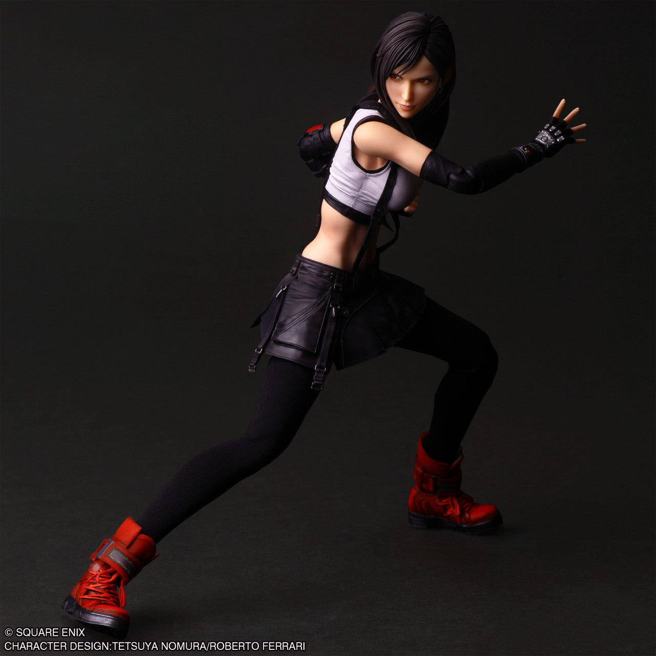 Play Arts Shin Action Figure: Final Fantasy VII Rebirth - Tifa Lockhart (PREORDER) - Articulated Tifa Lockhart action figure in black shorts, white crop top, black arm gloves, and red boots, posed ready to.