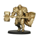 Vallejo True Metallic Metal Light: Arcane Gold (18ml) - Metallic gold-painted miniature knight holding a large hammer and shield on a black base.