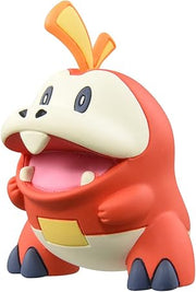 Takaratomy Pokemon Figure Collection - Fuecoco - Red and cream Fuecoco Pokemon figure with large mouth open, orange crest, and blue feet.