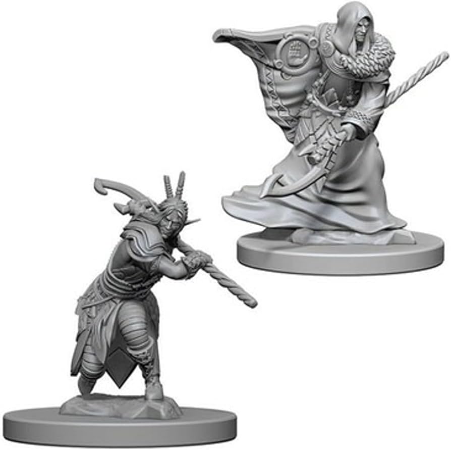 D&D Nolzur's Marvelous Miniatures: Elf Male Druid - One an elf druid with a staff and swirling cloak, the other a horned warrior crouching with a spear.