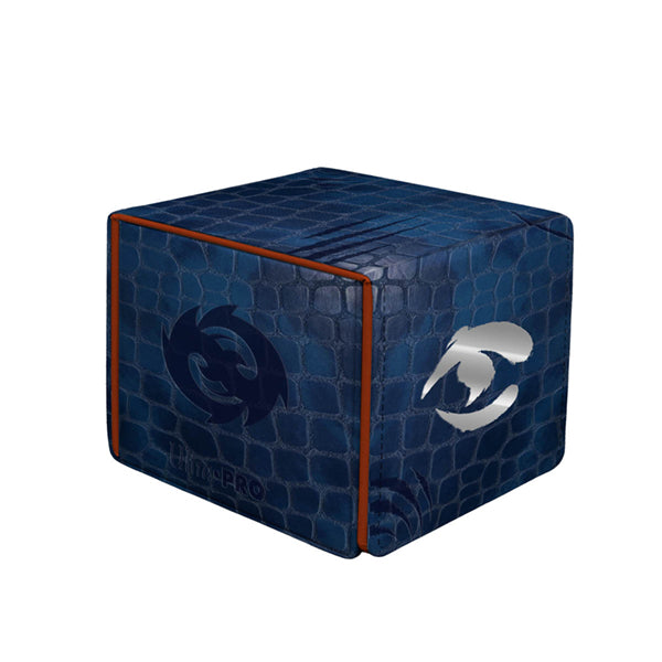 Alcove Edge Deckbox - Tarkir Dragonstorm - Shiko, Paragon of the Way - 100+ - Dark blue textured deckbox with embossed swirling dragon and silver dragon head symbols, orange trim edges.