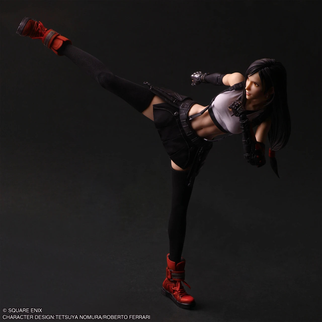Play Arts Shin Action Figure: Final Fantasy VII Rebirth - Tifa Lockhart (PREORDER) - Tifa Lockhart action figure in dynamic high kick pose wearing black skirt, white crop top, long black gloves, and red boots.