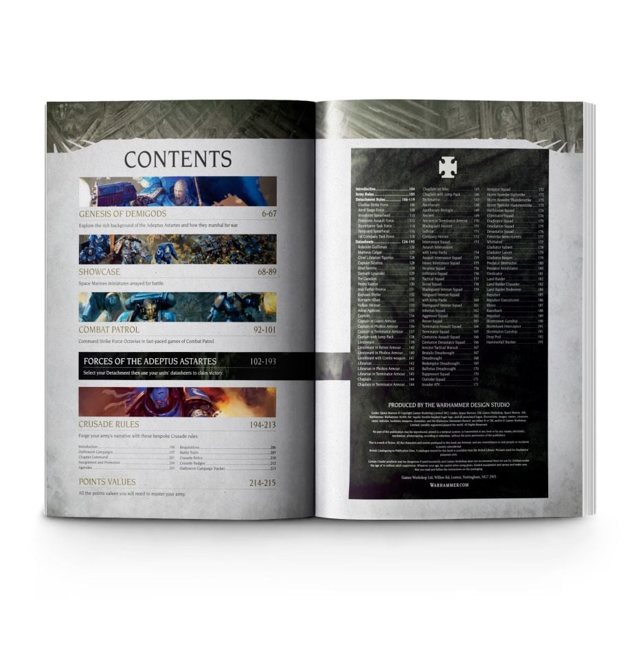 Warhammer 40,000 - Space Marines - Codex - Open Warhammer 40,000 Space Marines Codex with colorful contents page on left and black rules page on right.